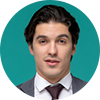 Professional man in suit with teal background.